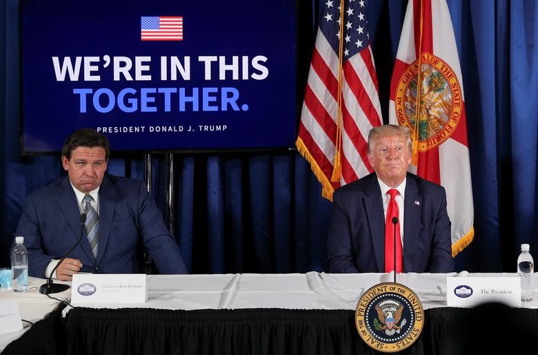 President Donald Trump participates in a "COVID-19 Response and Storm Preparedness" event with Florida Governor Ron DeSantis at the Pelican Golf Club in Belleair, Florida, July 31. REUTERS/Tom Brenner